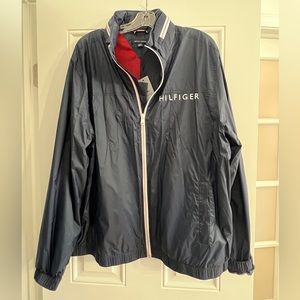 Tommy Hilfiger Navy wind and water resistant wind breaker hooded jacket.